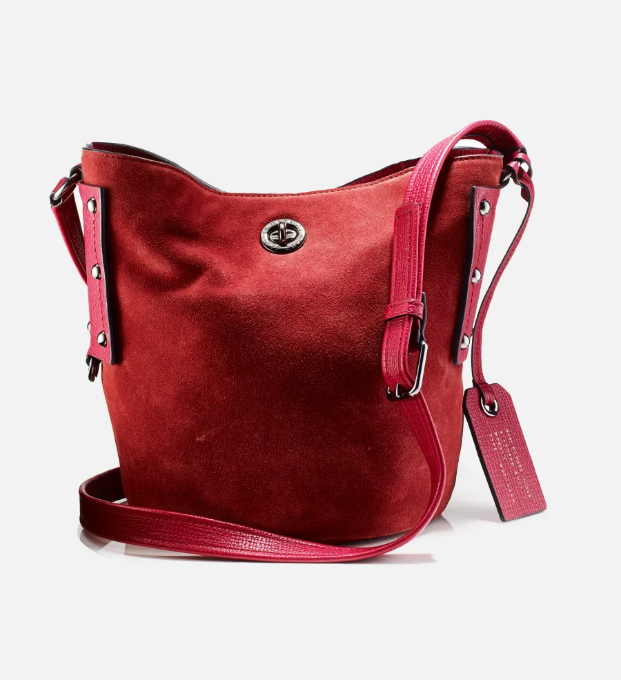 Red suede crossbody bag, directed product photography