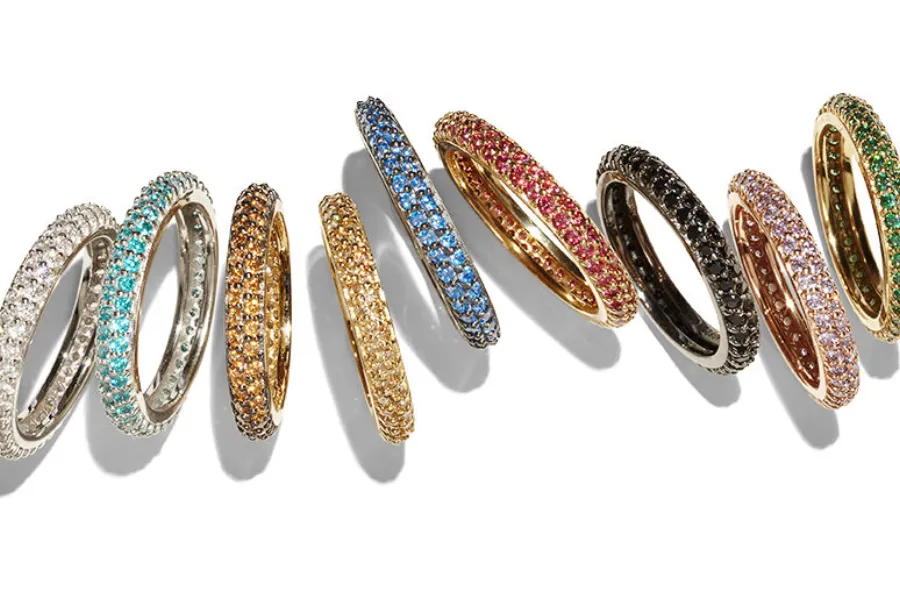 Colorful gemstone eternity ring stack, directed product photography