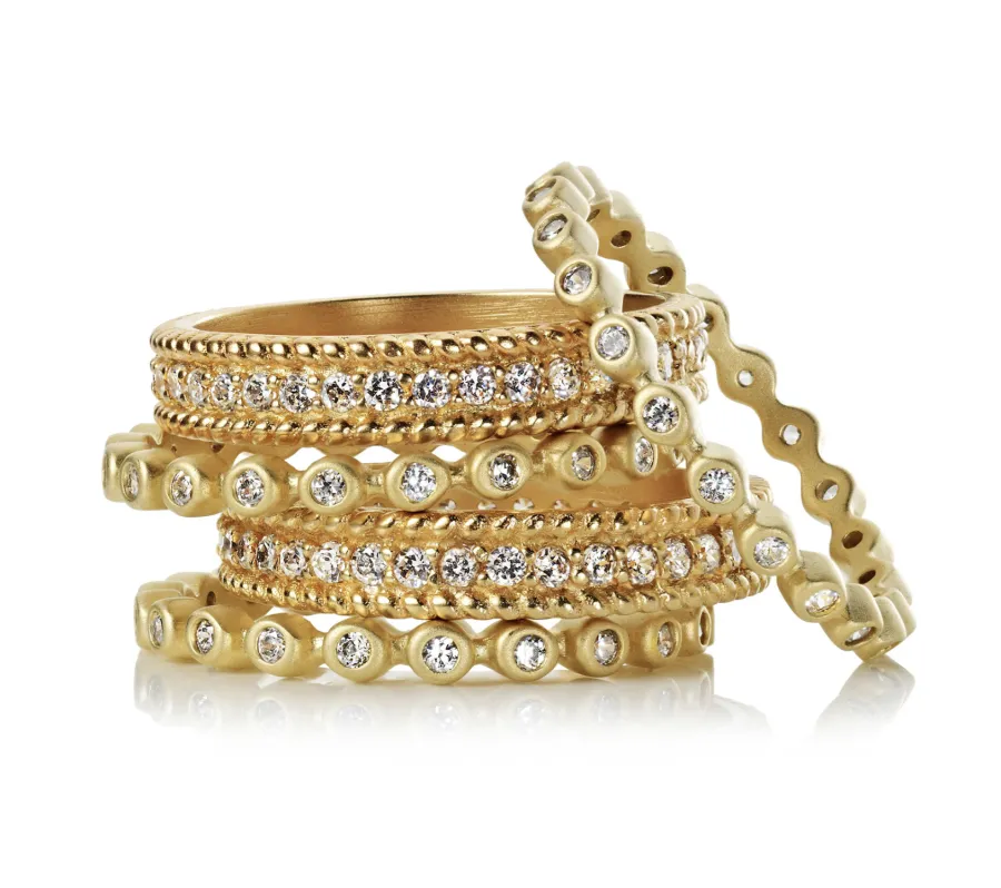 Gold bangle and ring stack, directed product photography