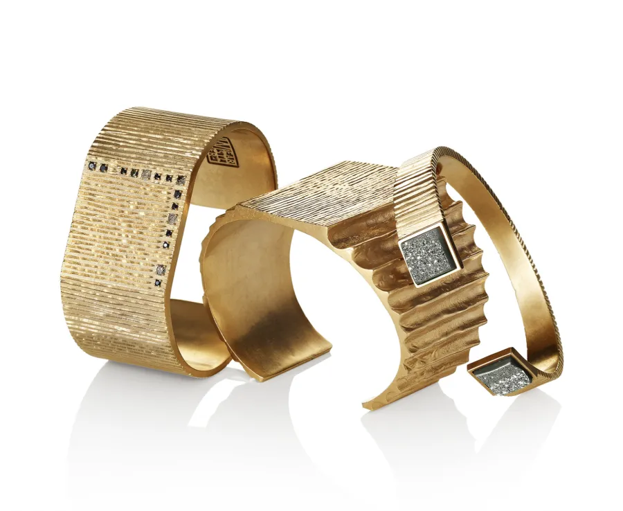 Gold cuff bracelet pair, directed product photography
